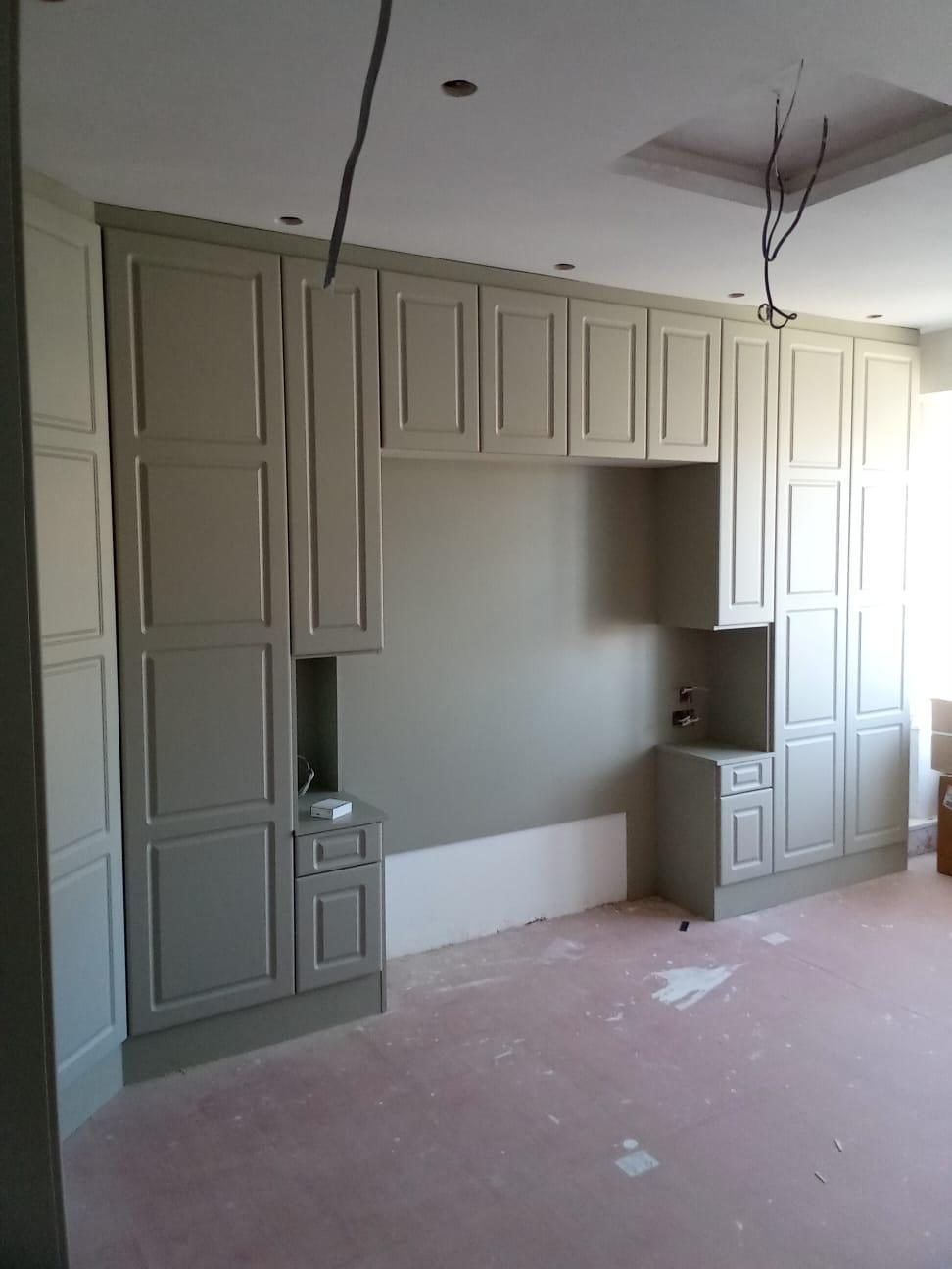 Painted fitted wardrobes and cabinets by Kulwant Carpentry