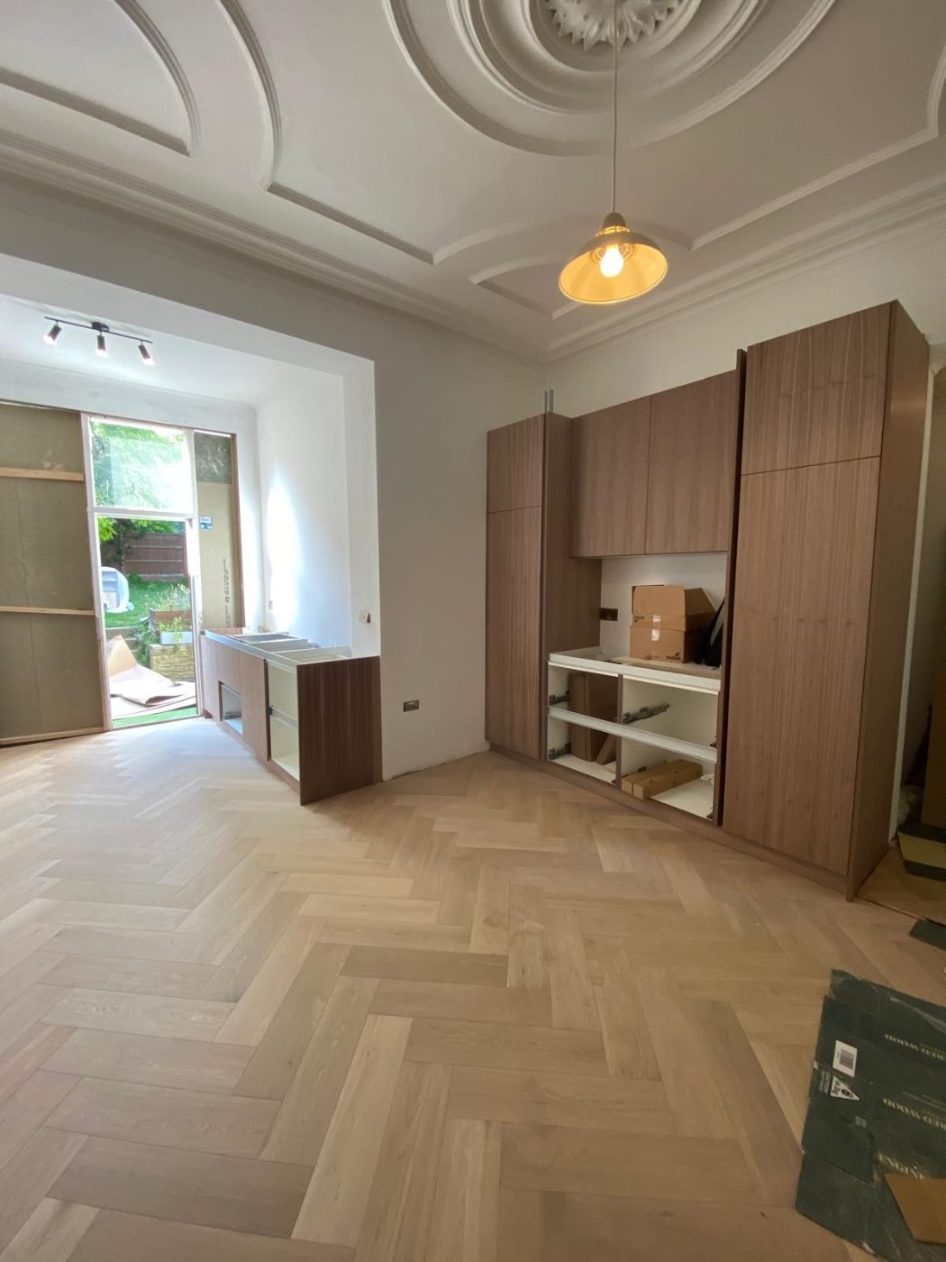 Fitted walnut storage units by Kulwant Carpentry, Wolverhampton